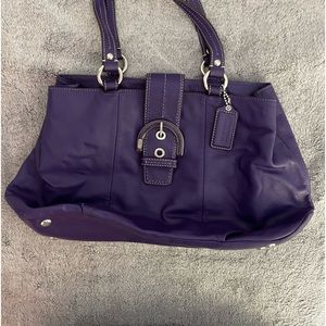 Authentic Coach purple Soho bag. Excellent condition. No visible flaws.